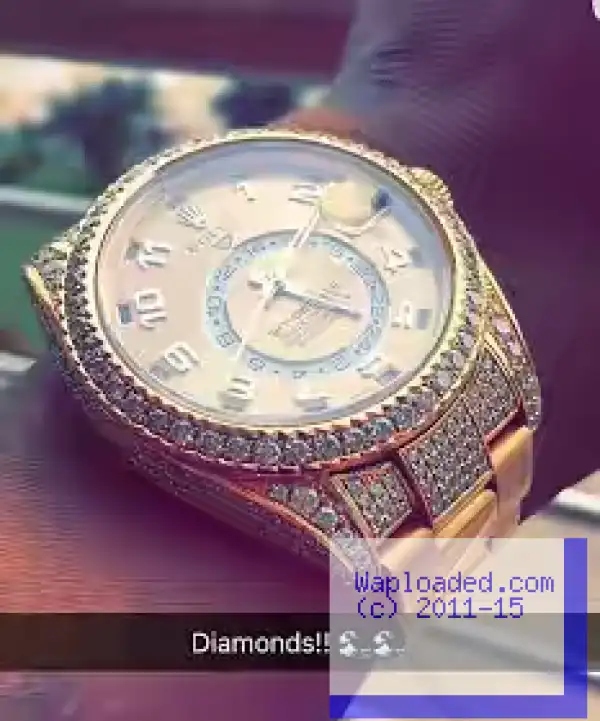 Wizkid Wants You To See His Diamond Rolex Wristwatch